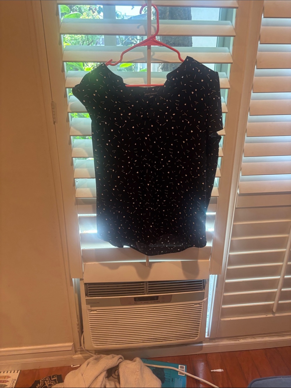 Classic Black Cap-Sleeve Blouse with Subtle White Print